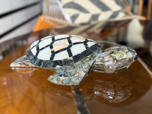 Turtle made of mother-of-pearl and obsidian, handmade in Mexico